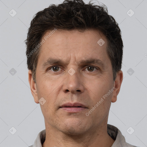 Neutral white adult male with short  brown hair and brown eyes