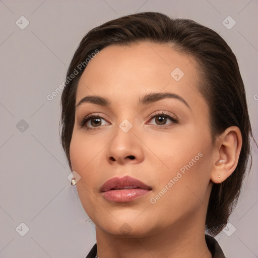 Neutral white young-adult female with medium  brown hair and brown eyes