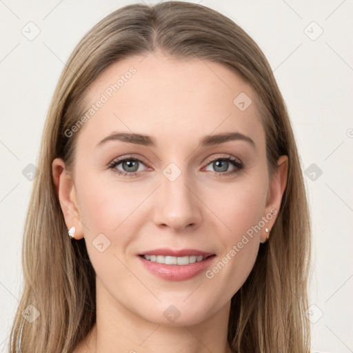 Joyful white young-adult female with long  brown hair and grey eyes