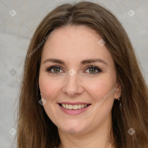 Joyful white young-adult female with long  brown hair and green eyes