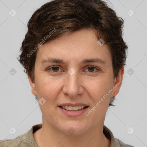 Joyful white adult female with short  brown hair and grey eyes