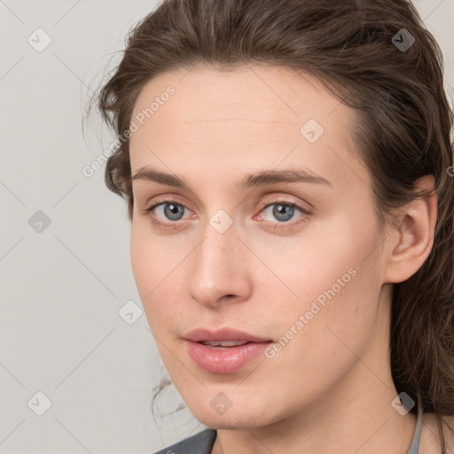 Neutral white young-adult female with medium  brown hair and grey eyes