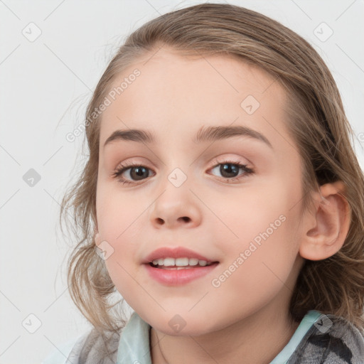 Joyful white child female with medium  brown hair and brown eyes