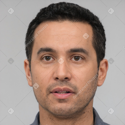 Neutral white young-adult male with short  black hair and brown eyes