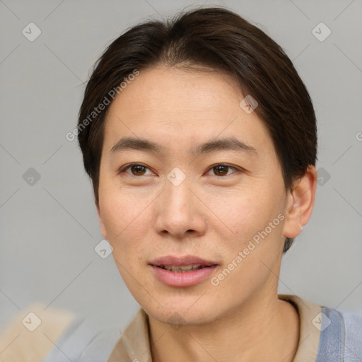 Joyful asian young-adult female with short  brown hair and brown eyes