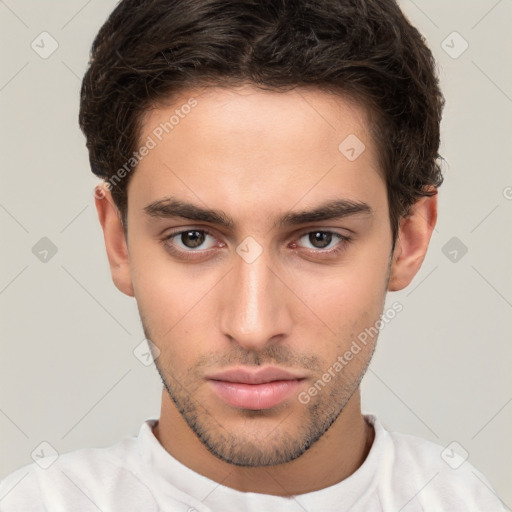 Neutral white young-adult male with short  brown hair and brown eyes