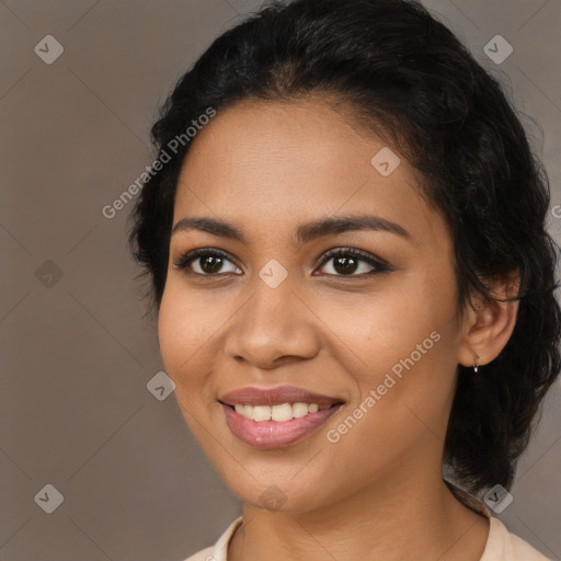 Joyful latino young-adult female with medium  brown hair and brown eyes