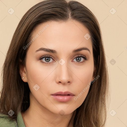 Neutral white young-adult female with long  brown hair and brown eyes