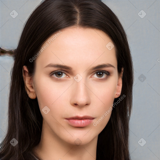 Neutral white young-adult female with long  brown hair and brown eyes