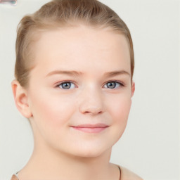 Joyful white child female with short  brown hair and grey eyes