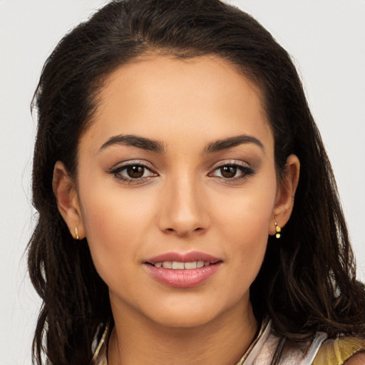 Joyful white young-adult female with long  brown hair and brown eyes