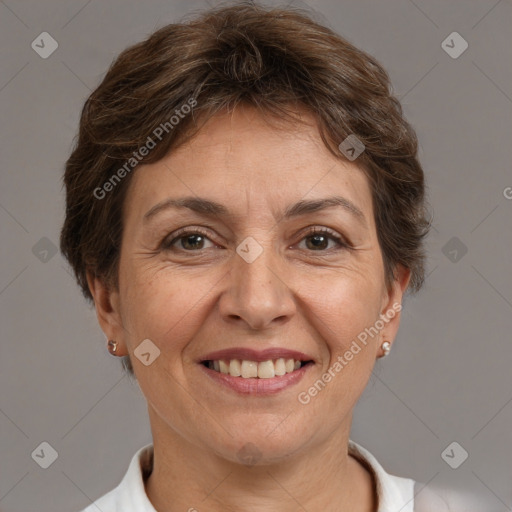 Joyful white adult female with short  brown hair and brown eyes