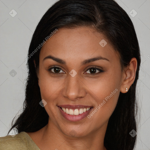 Joyful black young-adult female with medium  brown hair and brown eyes