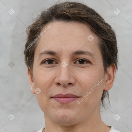 Joyful white adult female with short  brown hair and brown eyes