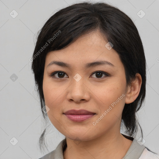 Joyful asian young-adult female with medium  brown hair and brown eyes