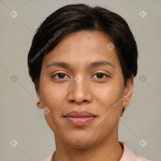 Joyful white adult female with short  brown hair and brown eyes