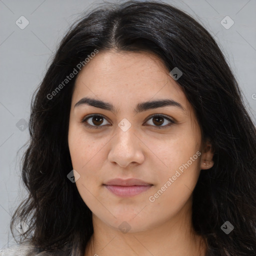 Joyful asian young-adult female with long  brown hair and brown eyes