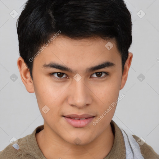 Joyful asian young-adult male with short  brown hair and brown eyes