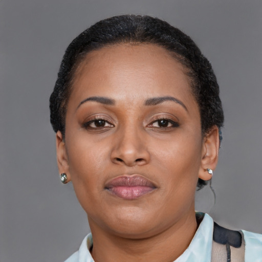 Neutral black young-adult female with short  brown hair and brown eyes