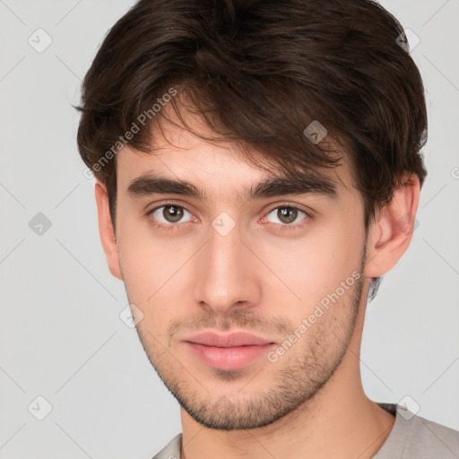 Neutral white young-adult male with short  brown hair and brown eyes