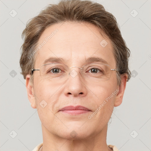 Joyful white adult male with short  brown hair and grey eyes