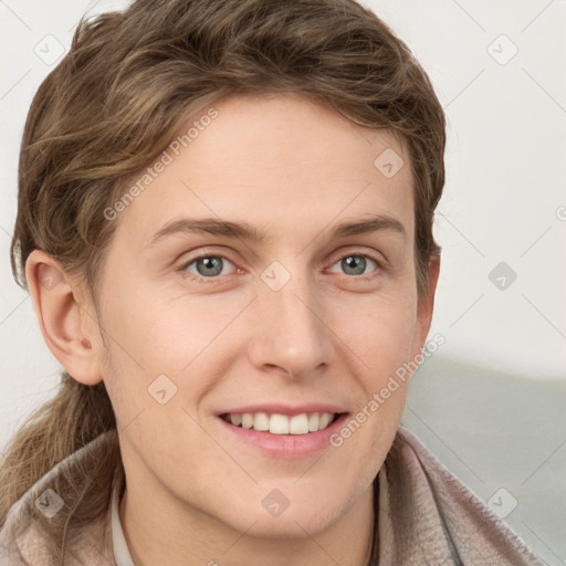 Joyful white young-adult female with short  brown hair and grey eyes