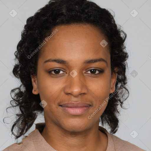 Joyful black young-adult female with long  brown hair and brown eyes