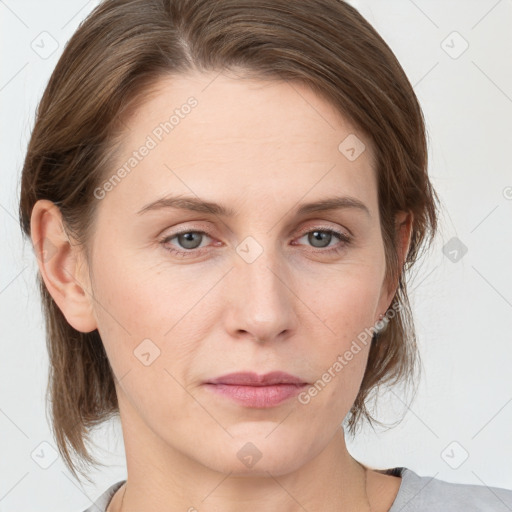 Neutral white young-adult female with medium  brown hair and grey eyes