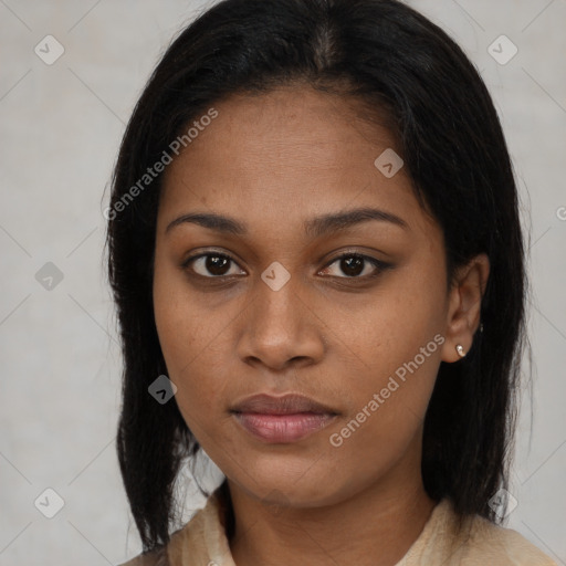 Neutral black young-adult female with medium  black hair and brown eyes