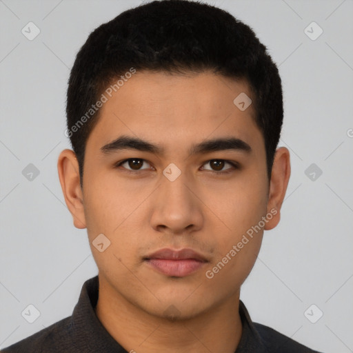 Neutral latino young-adult male with short  black hair and brown eyes