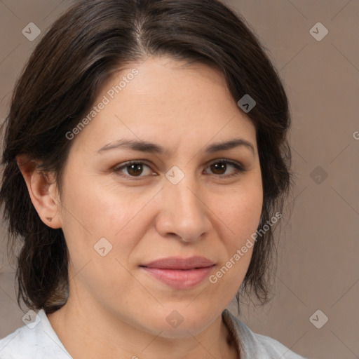 Joyful white adult female with medium  brown hair and brown eyes