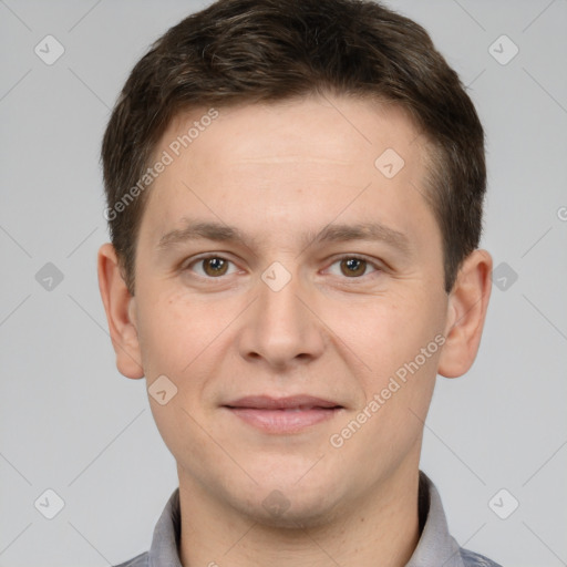 Joyful white young-adult male with short  brown hair and brown eyes