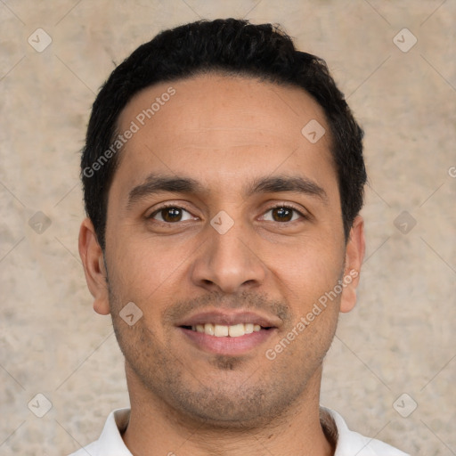 Joyful white young-adult male with short  black hair and brown eyes