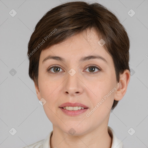 Joyful white young-adult female with short  brown hair and grey eyes