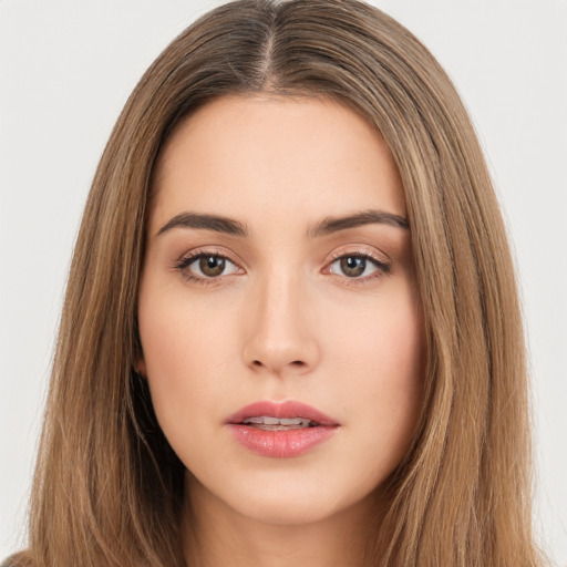 Neutral white young-adult female with long  brown hair and brown eyes