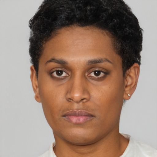 Neutral latino young-adult female with short  black hair and brown eyes