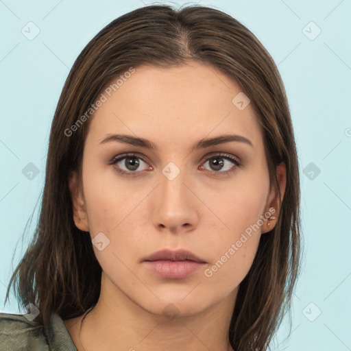 Neutral white young-adult female with long  brown hair and brown eyes