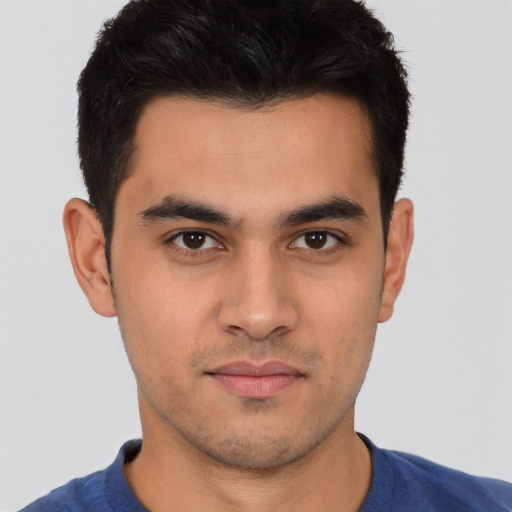 Neutral white young-adult male with short  black hair and brown eyes