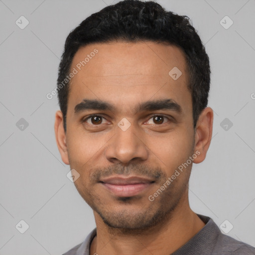 Joyful latino young-adult male with short  black hair and brown eyes