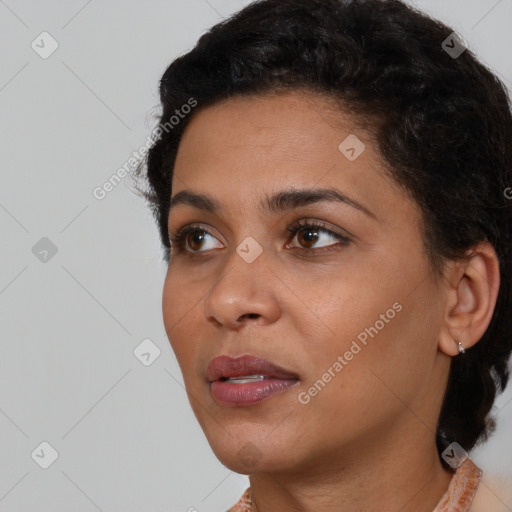 Neutral black young-adult female with short  black hair and brown eyes