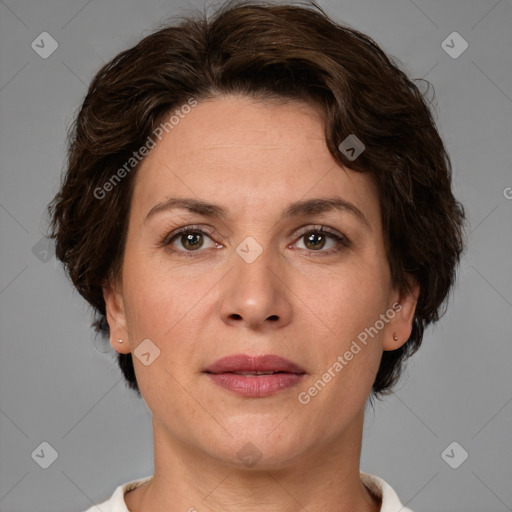 Joyful white adult female with short  brown hair and brown eyes