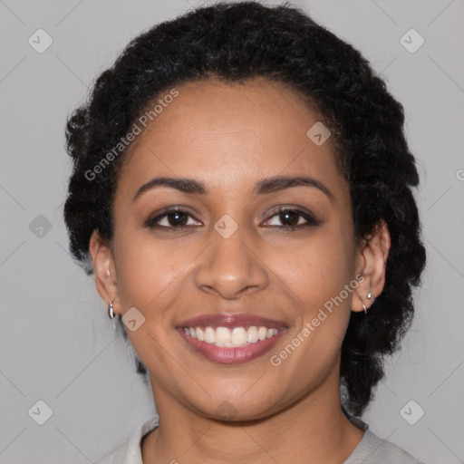 Joyful latino young-adult female with medium  black hair and brown eyes