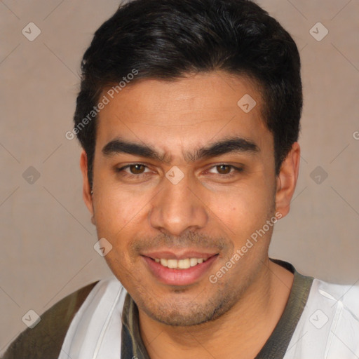 Joyful white young-adult male with short  black hair and brown eyes