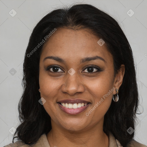 Joyful black young-adult female with long  brown hair and brown eyes