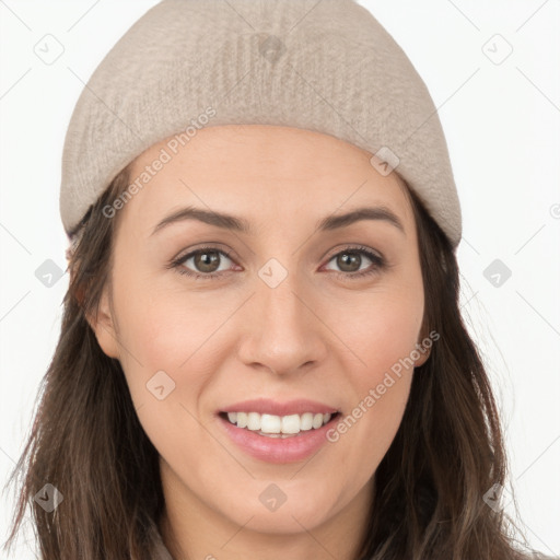 Joyful white young-adult female with long  brown hair and grey eyes