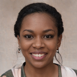 Joyful latino young-adult female with medium  black hair and brown eyes