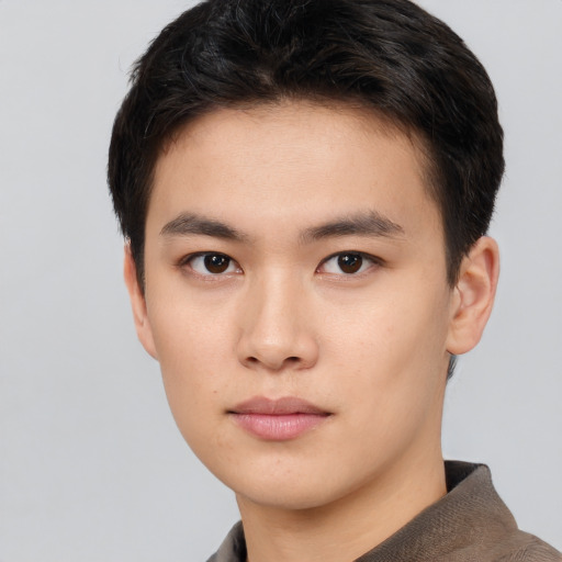 Neutral asian young-adult male with short  brown hair and brown eyes