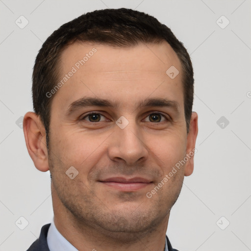 Joyful white adult male with short  brown hair and brown eyes