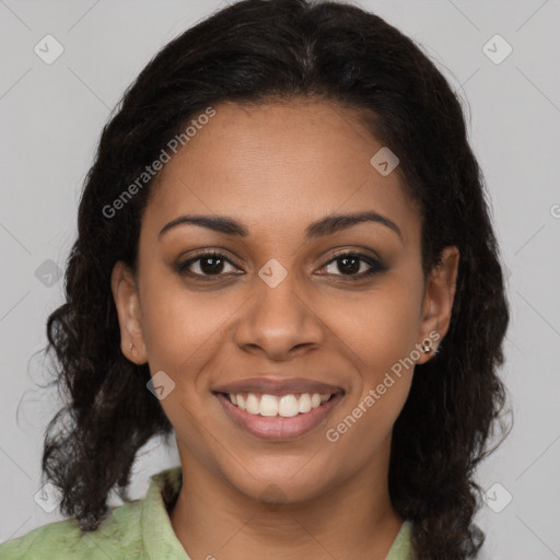 Joyful black young-adult female with medium  brown hair and brown eyes