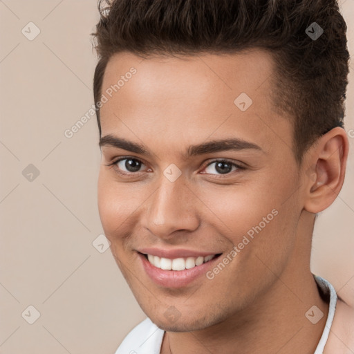 Joyful white young-adult male with short  brown hair and brown eyes